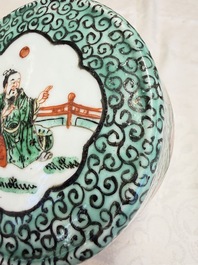 A Chinese famille verte jar and cover with narrative design, 19th C.