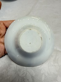 A pair of Chinese inscribed blue and white 'Clouds' tea bowls, covers and stands, Guangxu mark and of the period