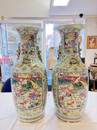 A pair of large Chinese famille rose celadon-ground 'Romance of the Three Kingdoms' vases, 19th C.