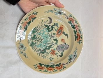 A pair of Chinese famille verte caf&eacute;-au-lait-ground plates with floral design, lotus mark, Kangxi