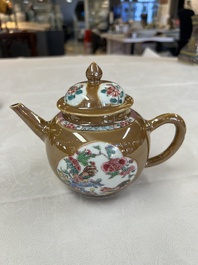 A Chinese famille rose capucine-ground covered teapot with floral design, seven cups and saucers, Yongzheng/Qianlong