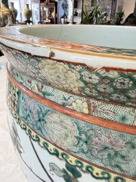 A pair of Chinese famille verte 'Flowers and Butterflies' fishbowls, 19th C.