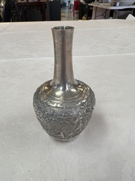 A Chinese Canton or Vietnamese silver bottle vase with landscape design and six cups, 19th C.