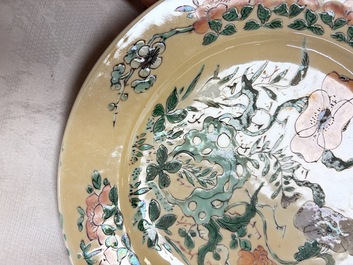 A pair of Chinese famille verte caf&eacute;-au-lait-ground plates with floral design, lotus mark, Kangxi