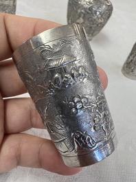A Chinese Canton or Vietnamese silver bottle vase with landscape design and six cups, 19th C.