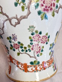 A pair of Chinese famille rose 'Phoenixes among Flowering Branches' vases and covers, 20th C.