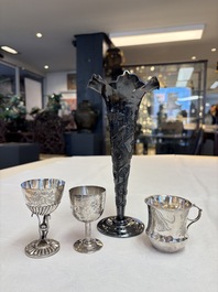 A Chinese silver 'Dragon' vase, two stem cups and a handled cup, various marks, 19/20th C.