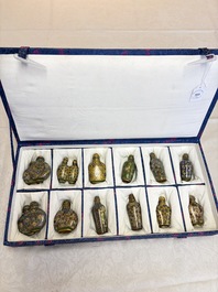 A collection of 12 Chinese cloisonn&eacute; snuff bottles with floral design, 19/20th C.