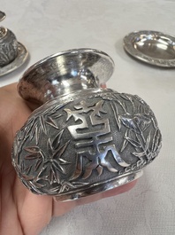 A pair of Chinese silver jarlets, a pair of saucer dishes, a rectangular casket and a cylindrical box, 19/20th C.
