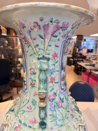 A pair of large Chinese famille rose celadon-ground 'Romance of the Three Kingdoms' vases, 19th C.