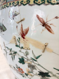 A pair of Chinese famille verte 'Flowers and Butterflies' fishbowls, 19th C.