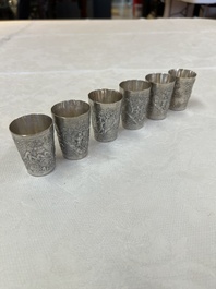 A Chinese Canton or Vietnamese silver bottle vase with landscape design and six cups, 19th C.