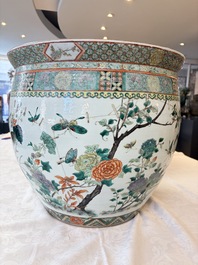 A pair of Chinese famille verte 'Flowers and Butterflies' fishbowls, 19th C.