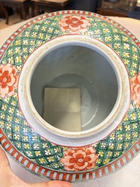 A Chinese famille verte jar and cover with narrative design, 19th C.