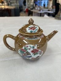 A Chinese famille rose capucine-ground covered teapot with floral design, seven cups and saucers, Yongzheng/Qianlong
