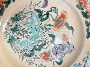 A pair of Chinese famille verte caf&eacute;-au-lait-ground plates with floral design, lotus mark, Kangxi