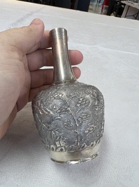 A Chinese Canton or Vietnamese silver bottle vase with landscape design and six cups, 19th C.