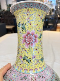 A pair of Chinese famille rose bottle vases, Qianlong mark, 20th C.