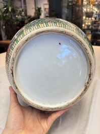 A Chinese famille verte jar and cover with narrative design, 19th C.