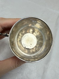 A Chinese silver 'Dragon' vase, two stem cups and a handled cup, various marks, 19/20th C.