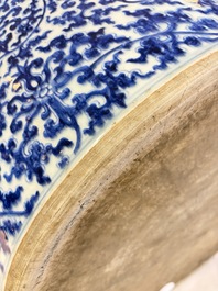 A massive Chinese blue and white 'Buddhist lotus scroll' circular basin, Kangxi