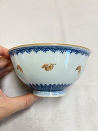 A pair of Chinese blue and white iron-red-decorated 'Three Star Gods' bowls, Qianlong mark and of the period