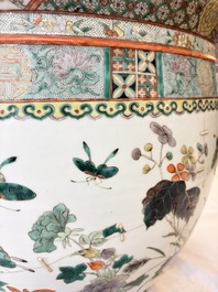 A pair of Chinese famille verte 'Flowers and Butterflies' fishbowls, 19th C.