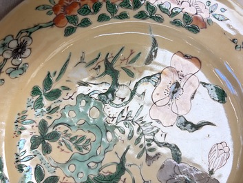 A pair of Chinese famille verte caf&eacute;-au-lait-ground plates with floral design, lotus mark, Kangxi