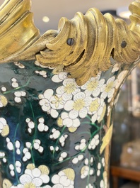 A massive pair of gilt-bronze-mounted famille noire style vases, Samson, Paris, 19th C.