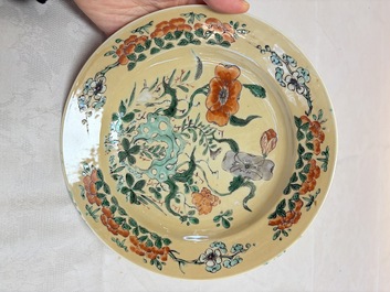 A pair of Chinese famille verte caf&eacute;-au-lait-ground plates with floral design, lotus mark, Kangxi