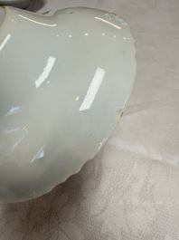 A pair of Chinese inscribed blue and white 'Clouds' tea bowls, covers and stands, Guangxu mark and of the period