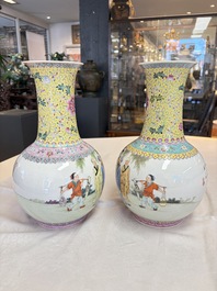 A pair of Chinese famille rose bottle vases, Qianlong mark, 20th C.