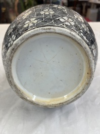 A rare Chinese famille noire 'Prunus on Cracked Ice' vase with 'Chilong' handles, 19th C.