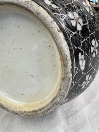 A rare Chinese famille noire 'Prunus on Cracked Ice' vase with 'Chilong' handles, 19th C.