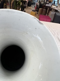 A rare Chinese famille noire 'Prunus on Cracked Ice' vase with 'Chilong' handles, 19th C.