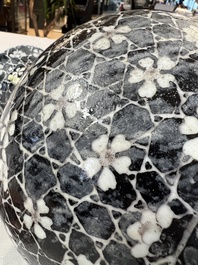 A rare Chinese famille noire 'Prunus on Cracked Ice' vase with 'Chilong' handles, 19th C.