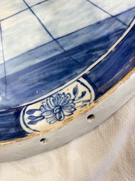 A blue and white Dutch Delftware 'The King's Wig' plaque, probably Rotterdam, 18th C.