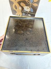 A Japanese mother-of-pearl-inlaid lacquer five-tier stacking box with two covers and a tray, 19/20th C.