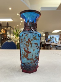 A Chinese red-overlay blue glass 'Cranes' hexagonal vase, Qianlong mark and of the period