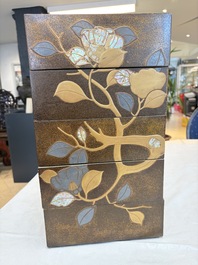 A Japanese mother-of-pearl-inlaid lacquer five-tier stacking box with two covers and a tray, 19/20th C.