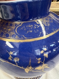 A Chinese gilt-decorated powder-blue-ground vase and cover, Kangxi mark, 19th C.