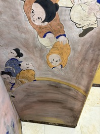 A Japanese six-panel folding screen or byōbu depicting children playing with an elephant, ink, colour and gold leaf on paper, Meiji, 19th C.