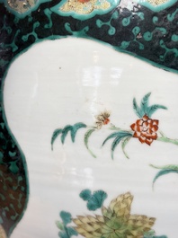 A Chinese famille verte black-ground jardini&egrave;re with birds, antiquities and flowers, 19th C.