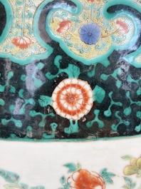 A Chinese famille verte black-ground jardini&egrave;re with birds, antiquities and flowers, 19th C.