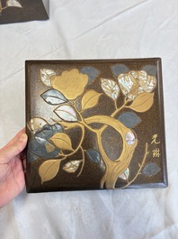 A Japanese mother-of-pearl-inlaid lacquer five-tier stacking box with two covers and a tray, 19/20th C.