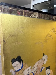 A Japanese six-panel folding screen or byōbu depicting children playing with an elephant, ink, colour and gold leaf on paper, Meiji, 19th C.