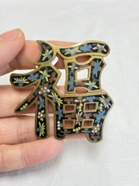 A Chinese enamelled silver 'Dragon' napkin ring, a pair of silver buckles and a pair of cloisonn&eacute; buckles, 19/20th C.