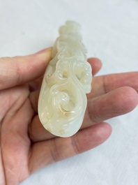 A fine Chinese white jade 'Dragon' belt hook, Qing