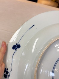 A large Chinese blue and white armorial dish with the arms of Pelgrom for the Dutch market, Kangxi