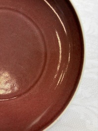 A Chinese copper-red-glazed plate, a meiping vase and two water pots, Kangxi marks, 19/20th C.
